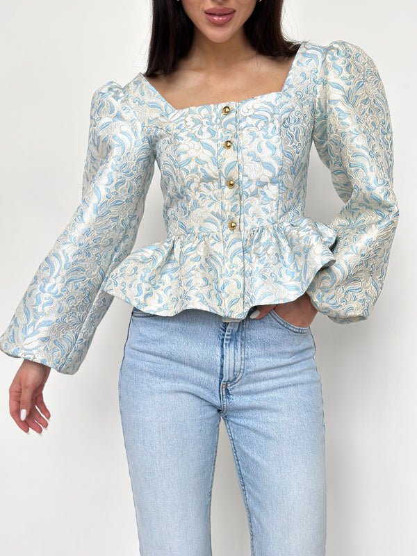 Jacquard blouse decorated with metal buttons in blue-white