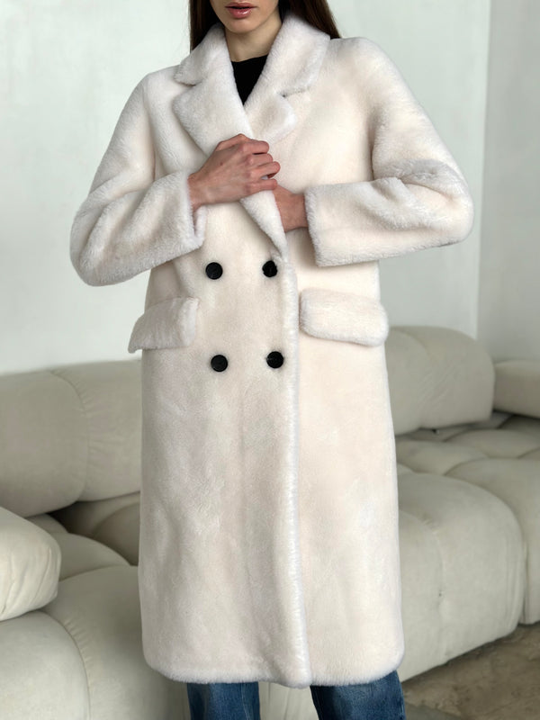 Fur coat made of 100% wool in milk